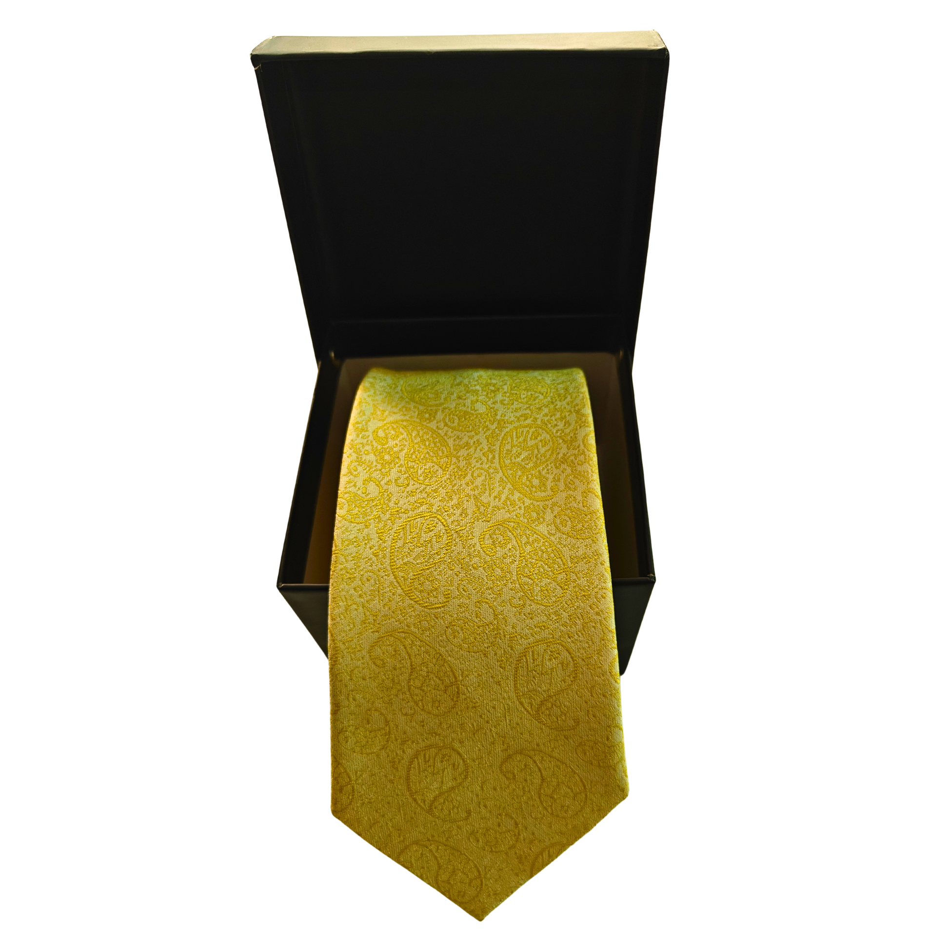 Yellow patterned tie in an open black box on a white background