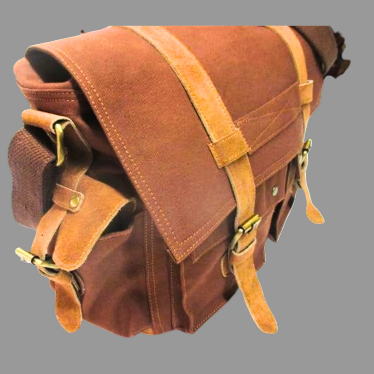 Brown leather satchel bag with gold buckles on a white background