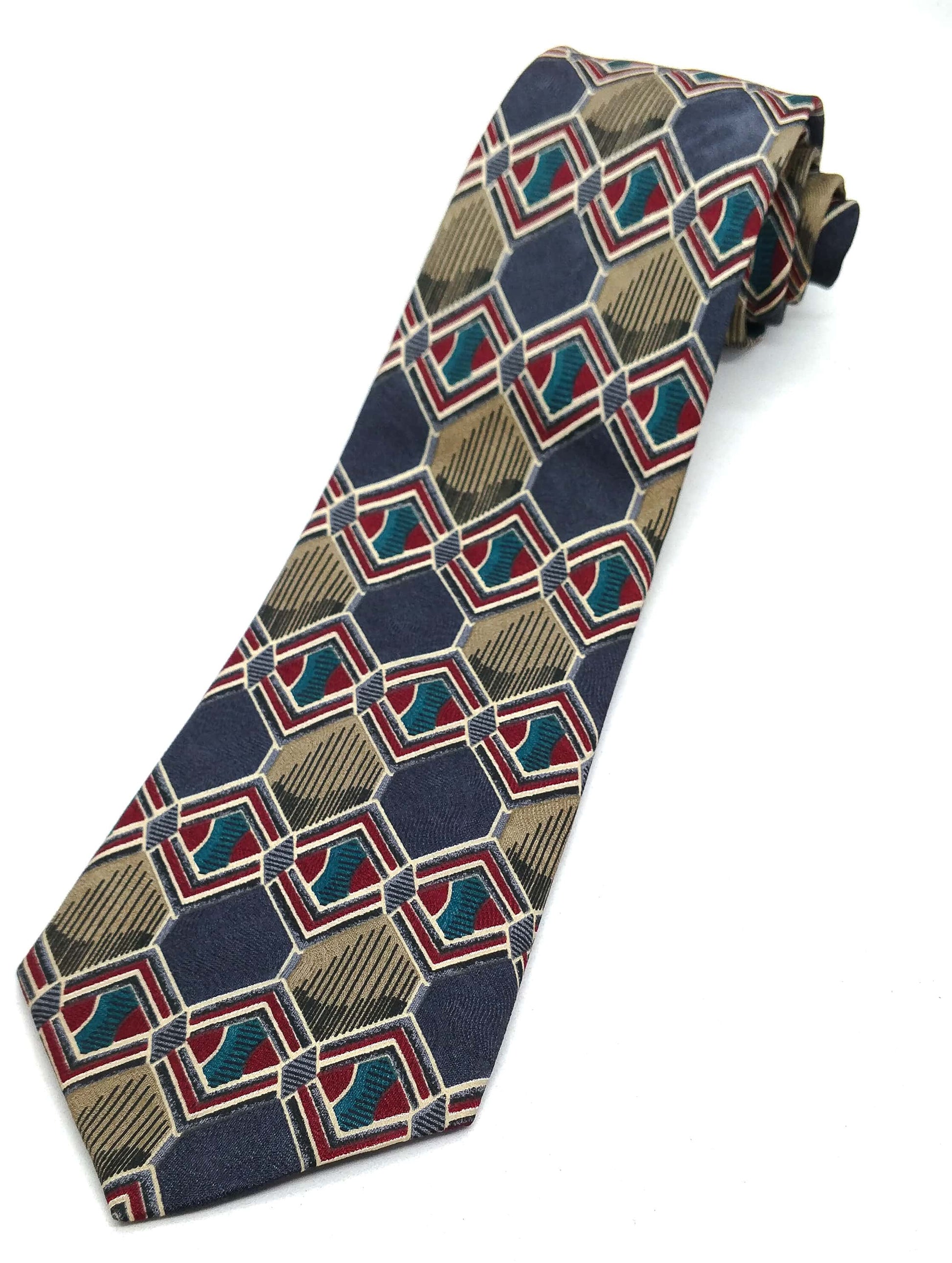 A jacquard silk necktie with a geometric pattern in multiple colors, displayed on a plain background.