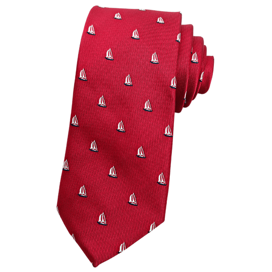 A red necktie with a microfibre fabric featuring a woven pattern of sailboats.